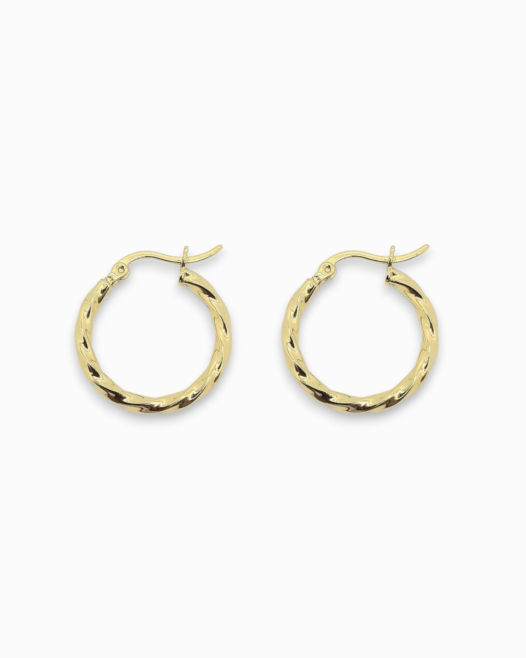 Gold twist hoop earrings on a white background