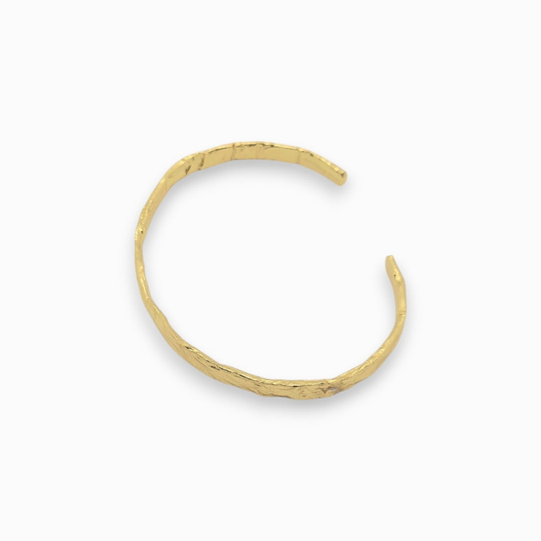 18k crushed Gold bracelet on a white background