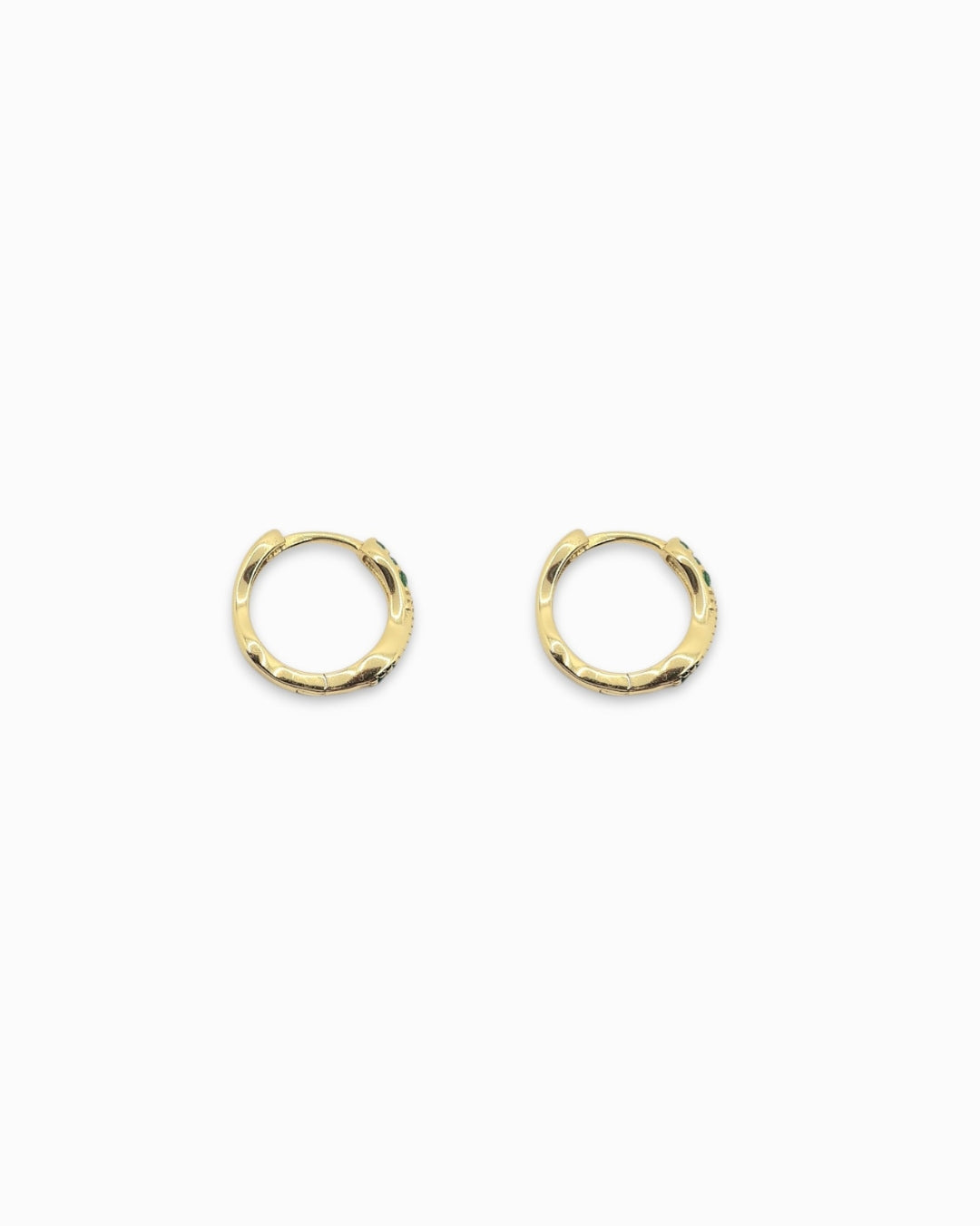 Jade huggie earrings flat lay on a white background