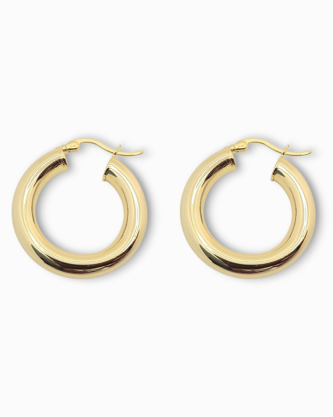 Chunky 18k Gold hoop earrings on a white background