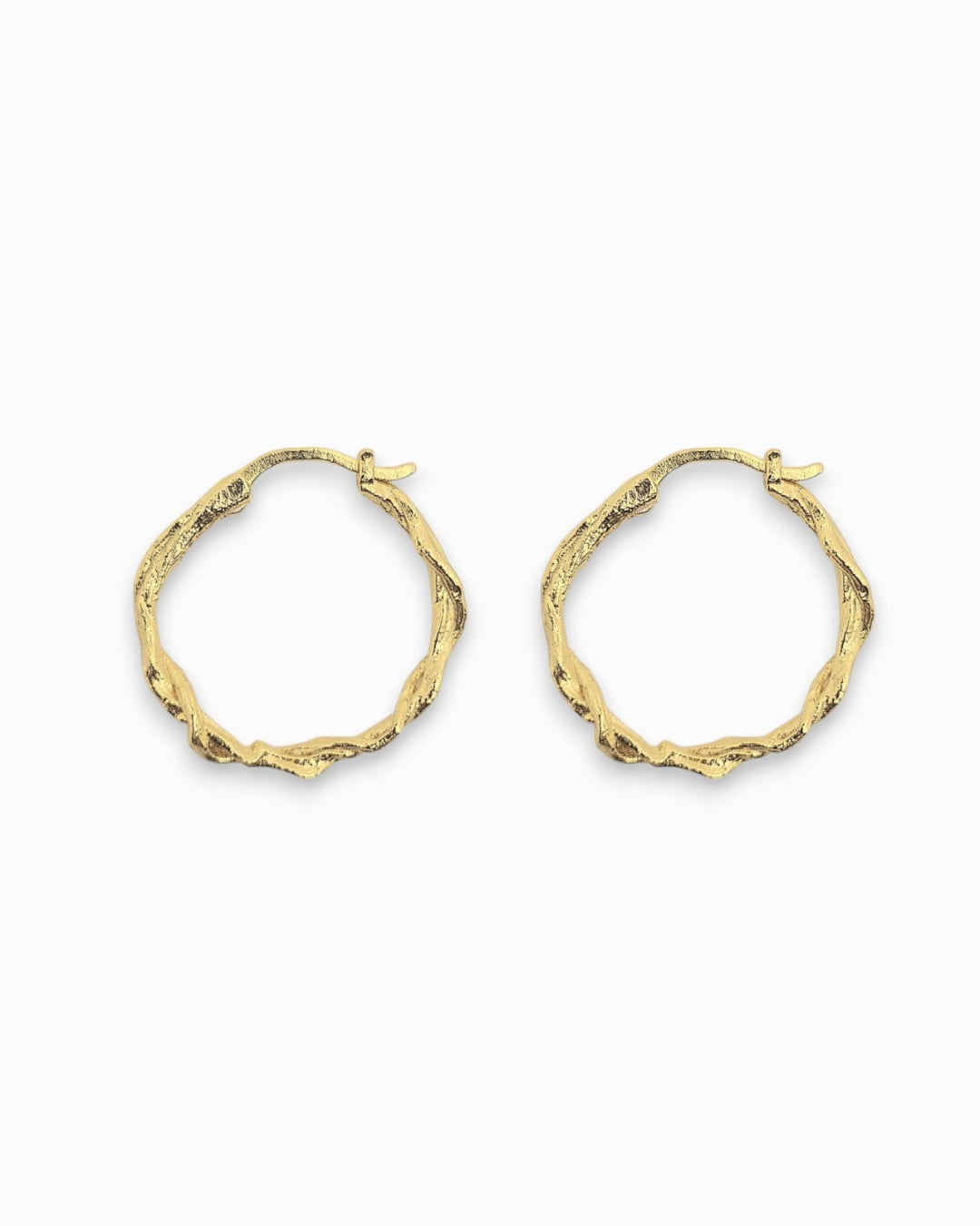Twist Gold hoop earrings on a white background