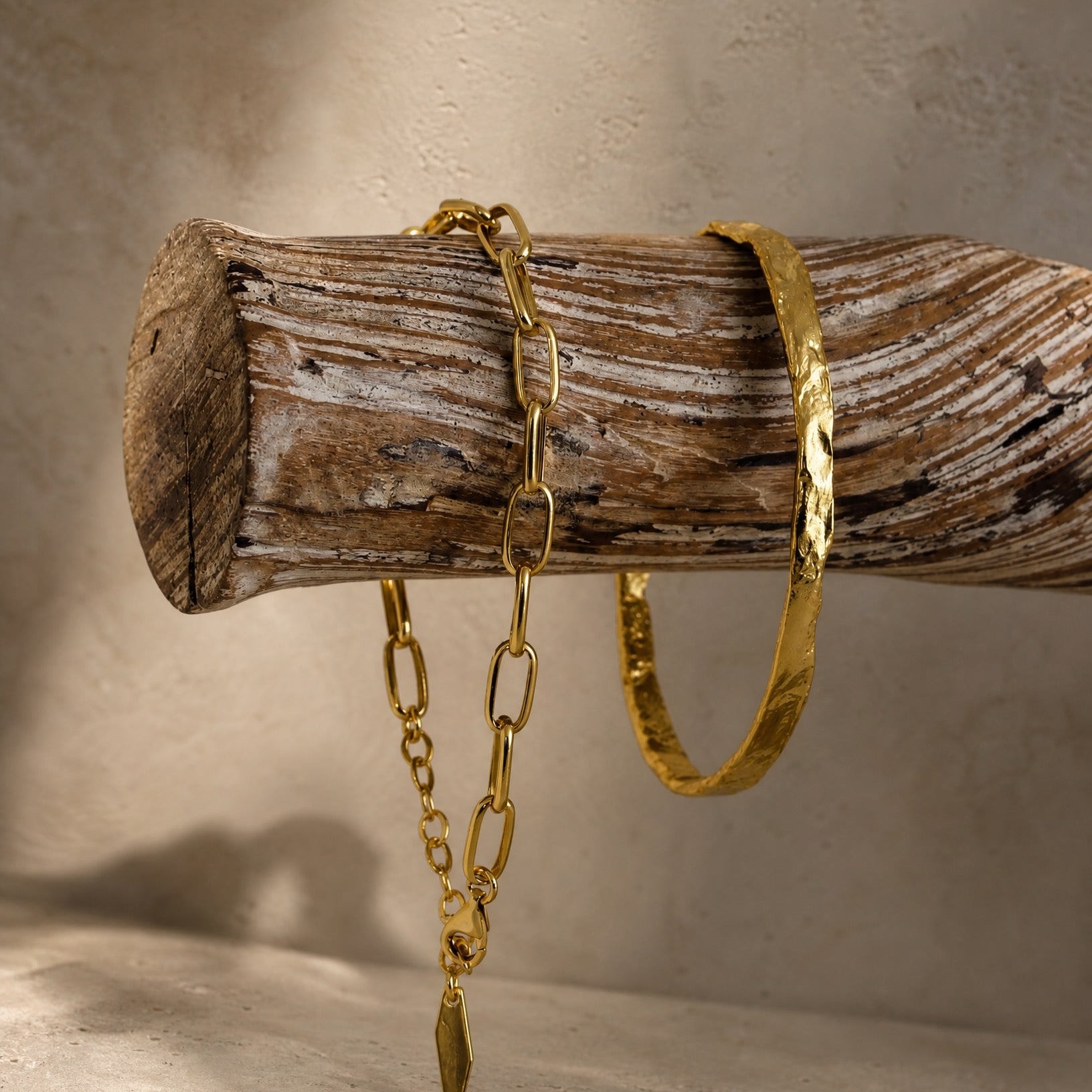 Styled product view of the Hunter Rose Ava 18k gold plated sterling silver chain bracelet.