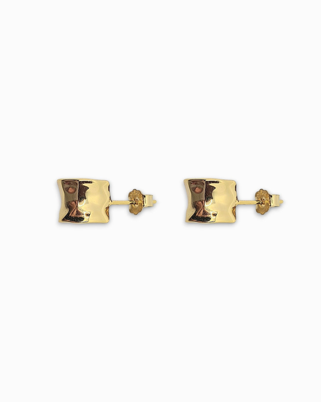 Pair of 18 carat gold vermeil hoop earrings on a white background