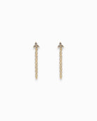 Pair of gold chain earrings with 3 tiny zirconia stones on a white background