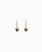 Heart-shaped pendant hoop earrings on a white background