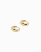 Lola huggie earrings on a white background