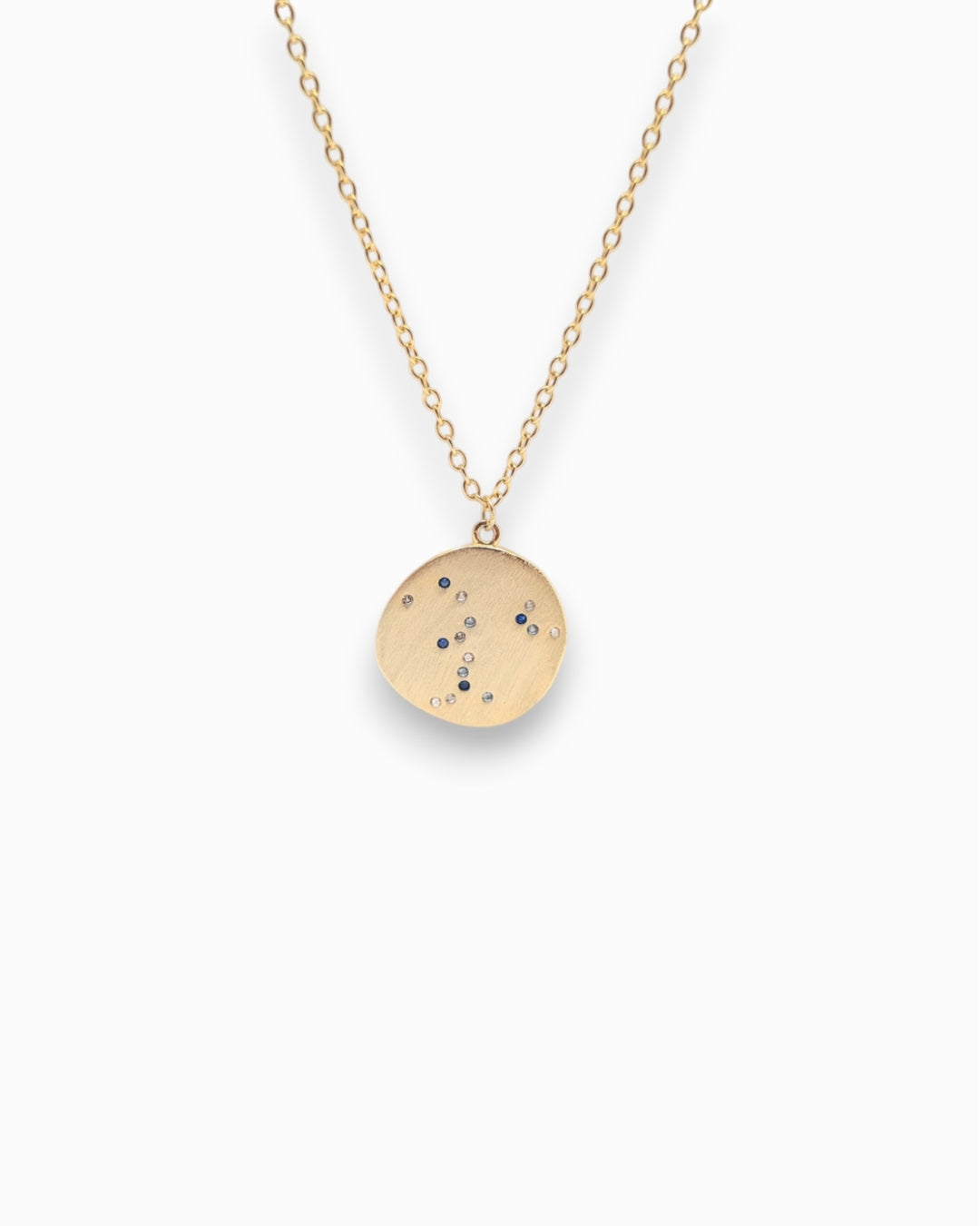 18k Gold necklace with a round pendant on a white background