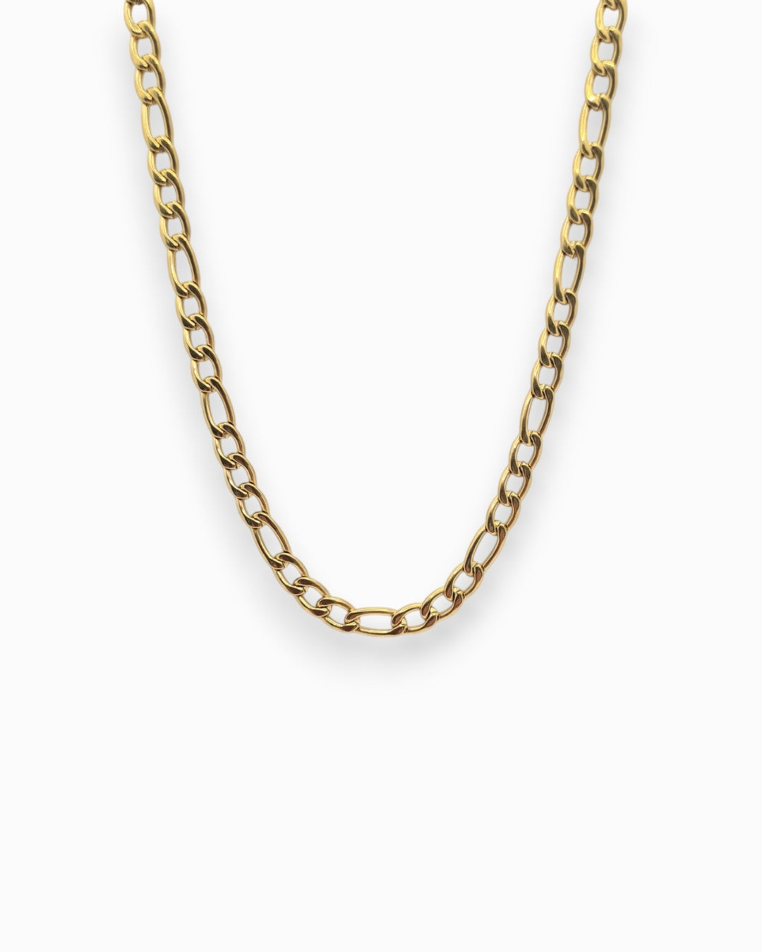 Gold Figaro chain necklace on a white background