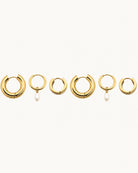Studio view of the Hunter Rose 18k gold waterproof triple hoop earring stack featuring a pearl pendant.