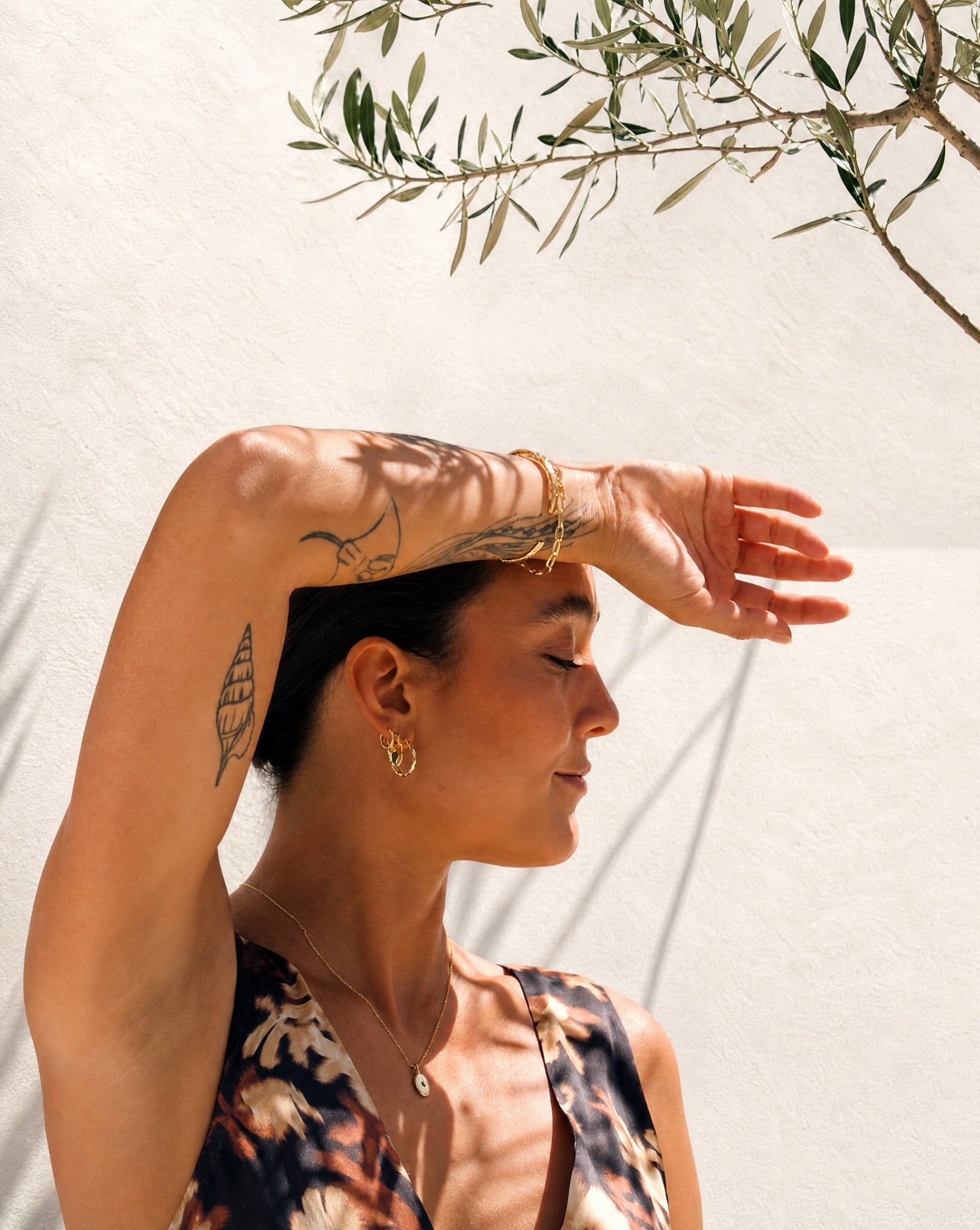 Everyday lifestyle styling of the Hunter Rose Ava demi-fine gold plated bracelet.
