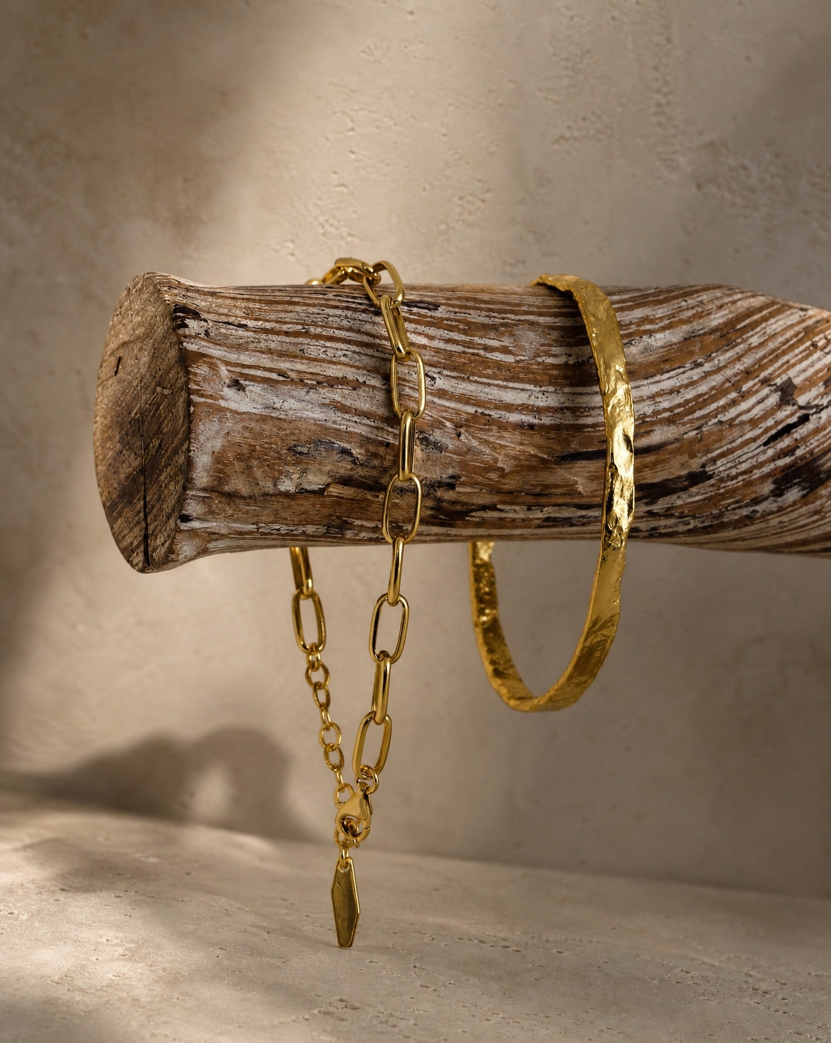 Styled product view of the Hunter Rose Ava 18k gold plated sterling silver chain bracelet.