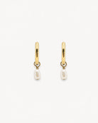 Alternative studio view of the tarnish-free Ayla gold pendant hoops by Hunter Rose.