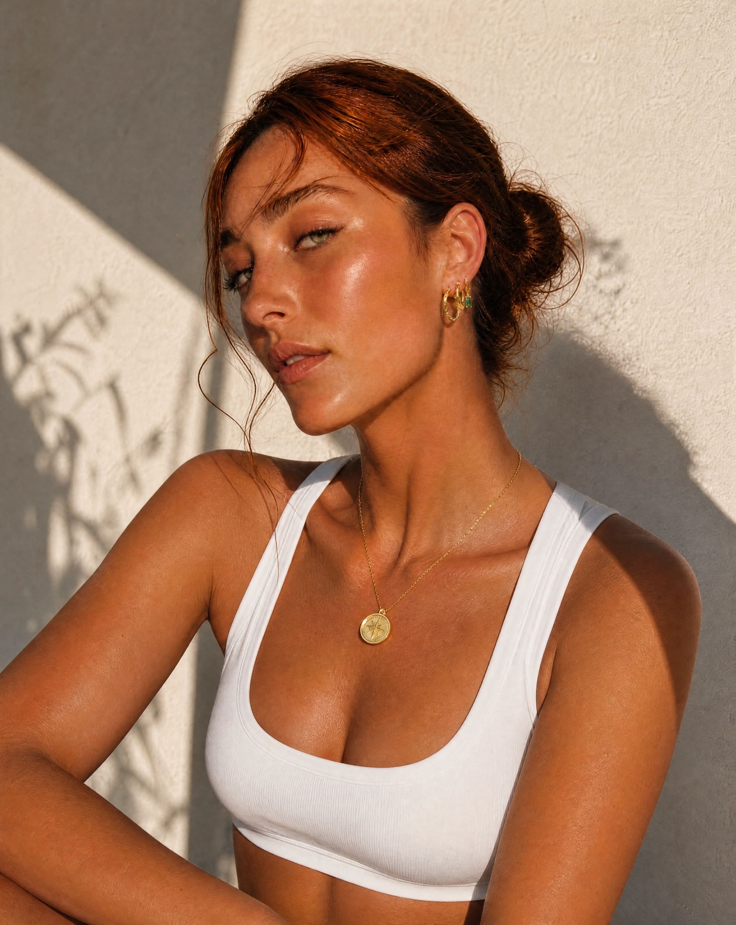 Lifestyle view of the hypoallergenic Bonny gold plated necklace by Hunter Rose.