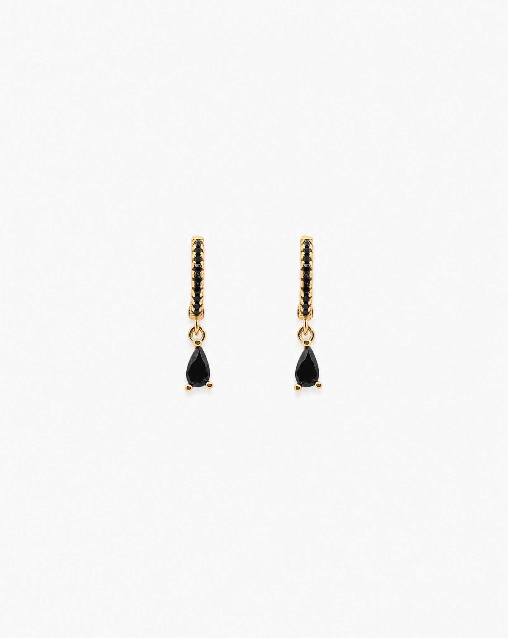 Close-up detail of the black zirconia stones on the Bronte 18k gold plated sterling silver hoops by Hunter Rose.