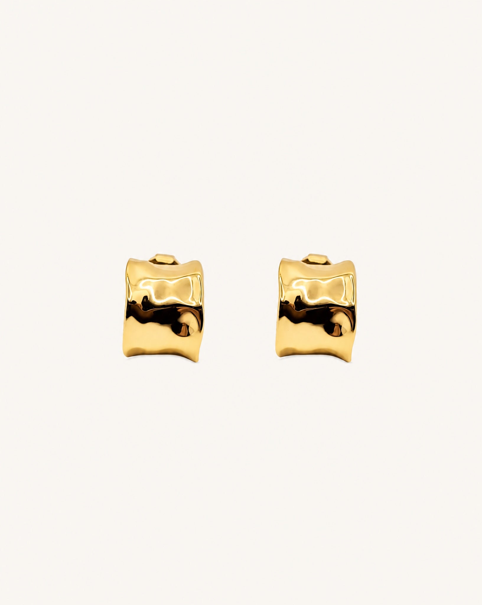 Alternative studio view of the textured 18k gold plated Charlie hoops by Hunter Rose.